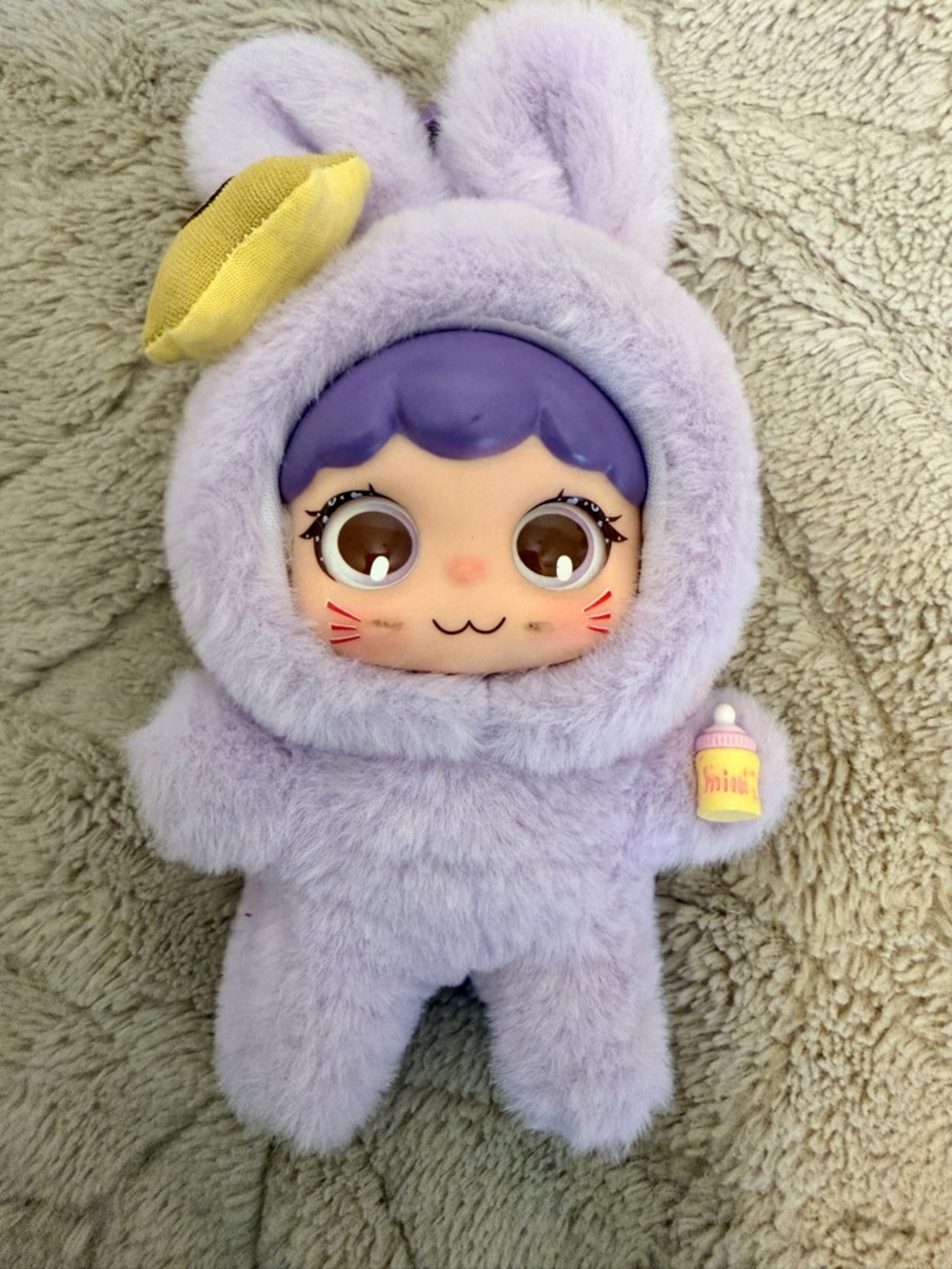 Nommi plush figure charm Loveliness Never Ends Series, specifically the "Tutu"